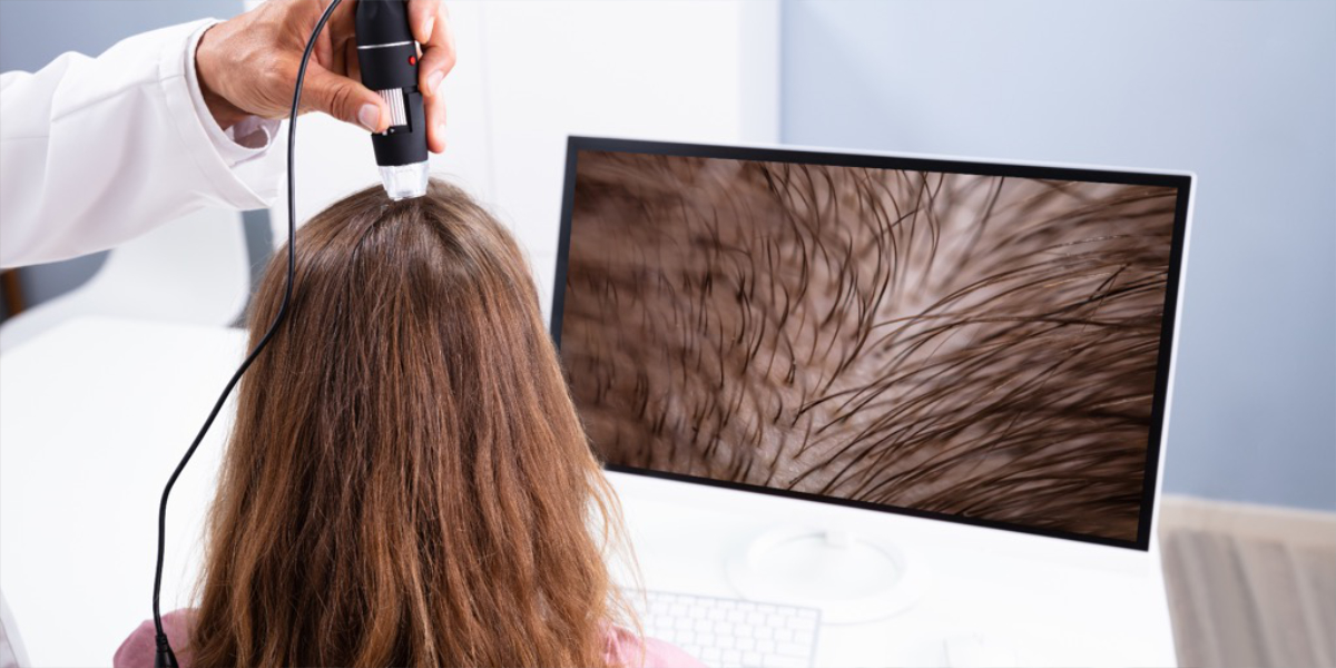 A woman during a hair diagnosis 