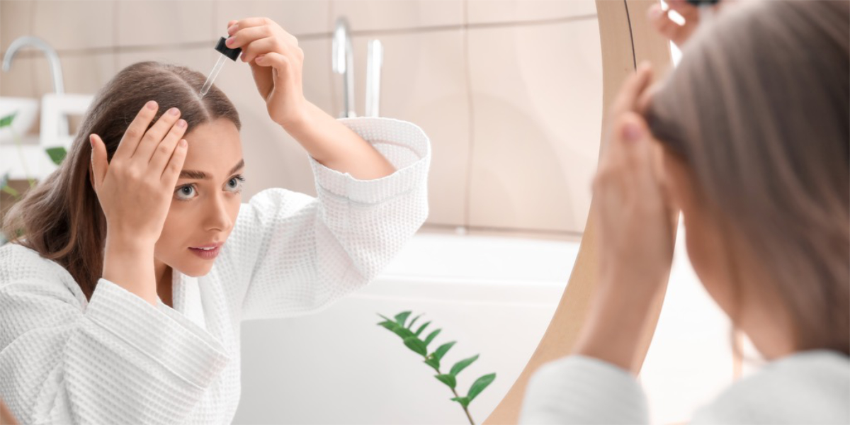 Female pattern baldness using minoxidil dropper