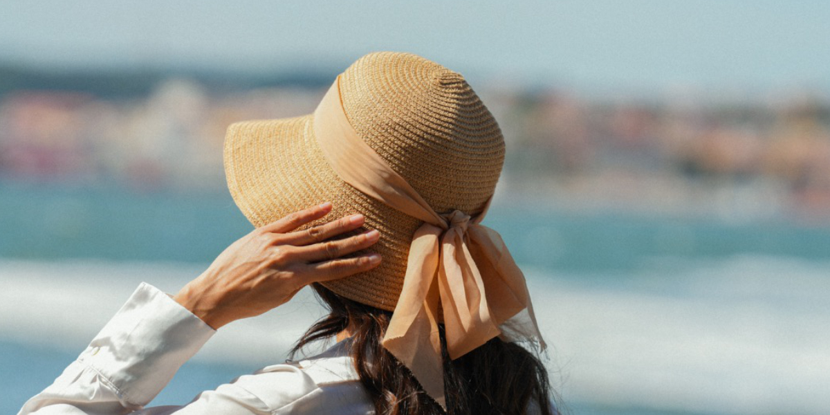 wearing a hat in summer