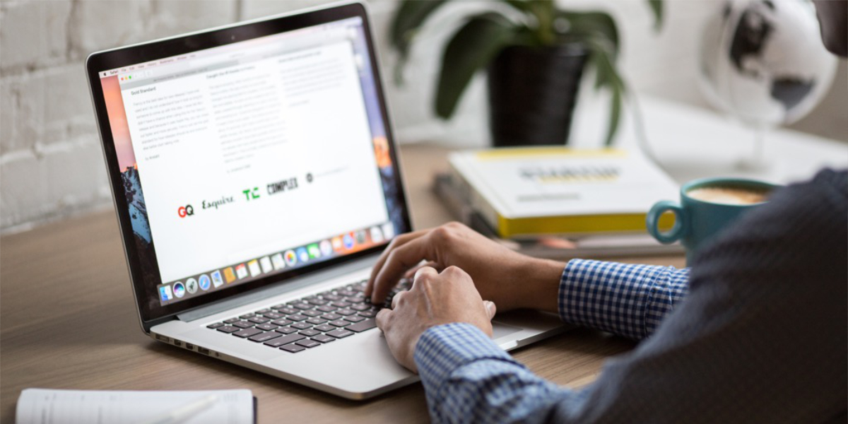 An image of a person researching on the computer