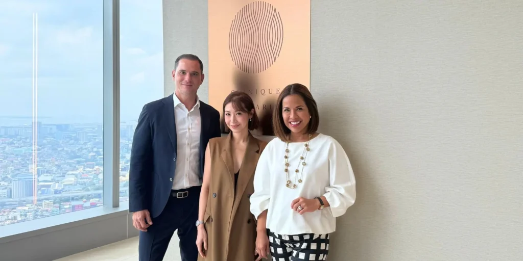 Kryzz Uy at Clinique de Paris with Managing Director Ludovic Branellec and Country Manager Nicole Sheker during a hair restoration visit in Makati, Philippines.
